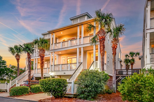 view of front of home with a balcony