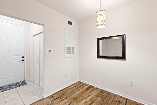 entrance foyer with light hardwood / wood-style floors