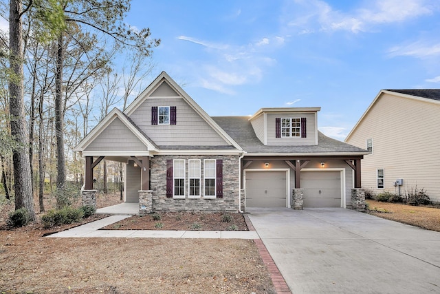 craftsman inspired home featuring a porch and a garage