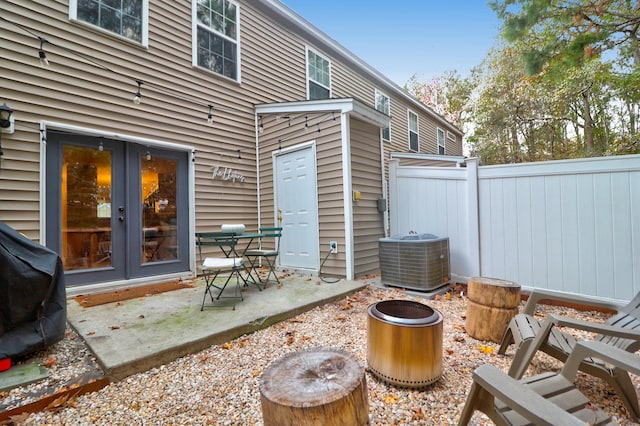 view of patio / terrace featuring central AC unit and a grill