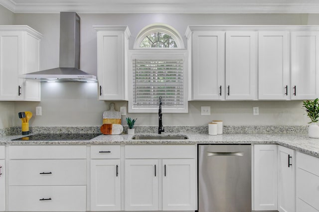 kitchen with a sink, dishwasher, black electric cooktop, wall chimney exhaust hood, and white cabinetry