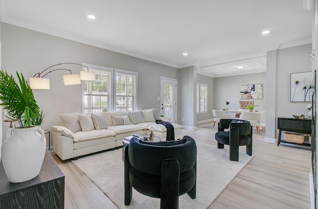 living room with recessed lighting, ornamental molding, and light wood-style floors
