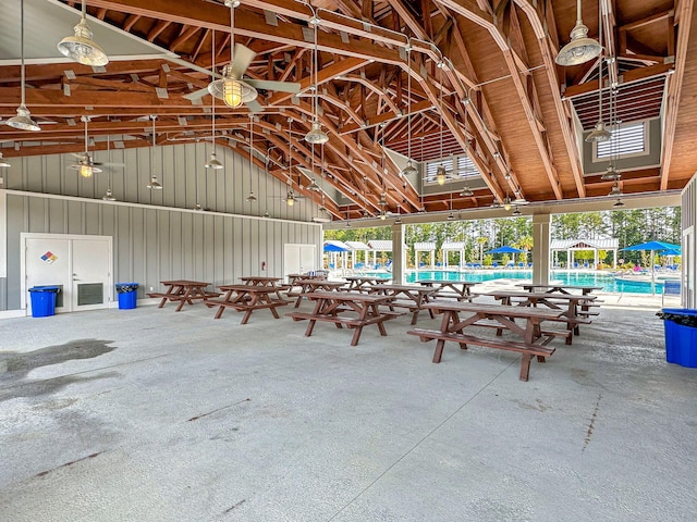 community pool featuring ceiling fan and a patio