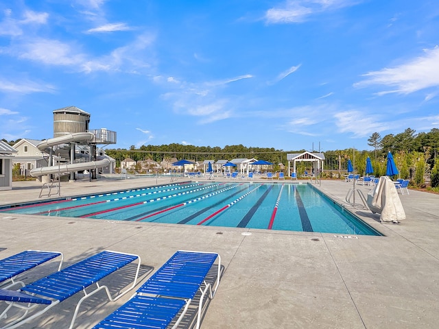 community pool featuring a patio area