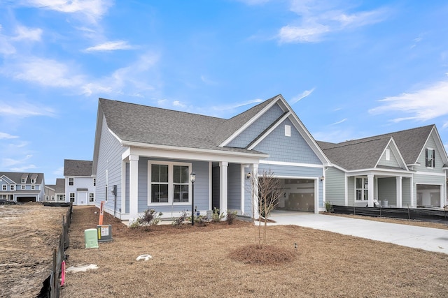 view of front of house with a garage and covered porch