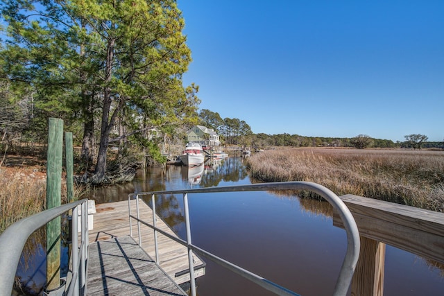 view of dock featuring a water view