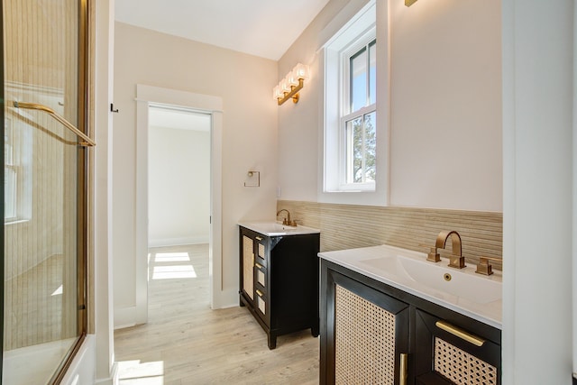 bathroom featuring vanity and wood-type flooring