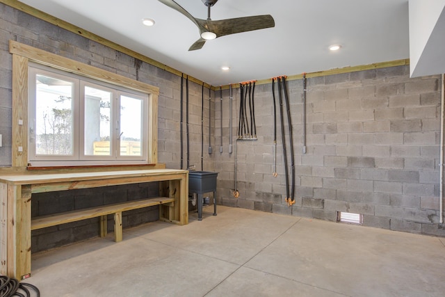 basement featuring ceiling fan