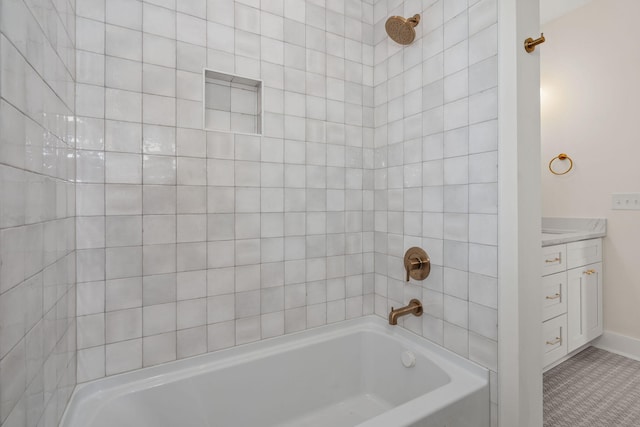 full bath featuring bathing tub / shower combination and vanity
