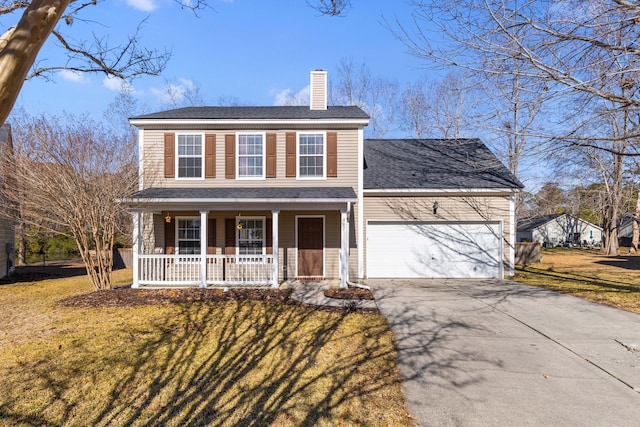 view of front facade featuring a garage, a front lawn, and a porch