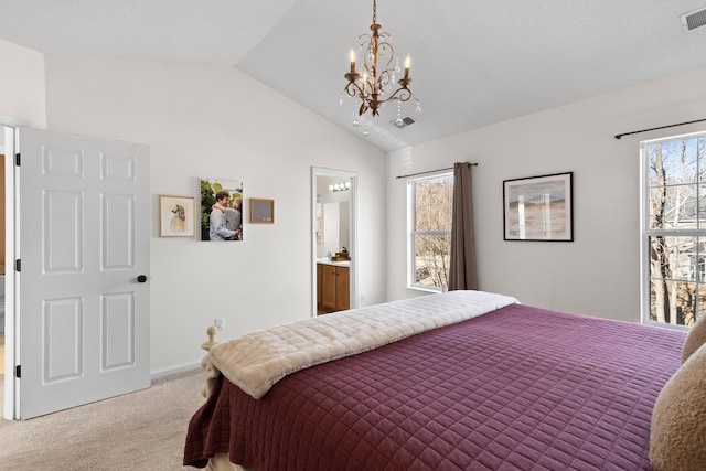 bedroom with lofted ceiling, light colored carpet, and a notable chandelier