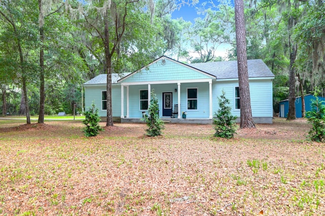 5233 Maybank Hwy, Wadmalaw Island, SC 29487 - ranch-style house with a porch