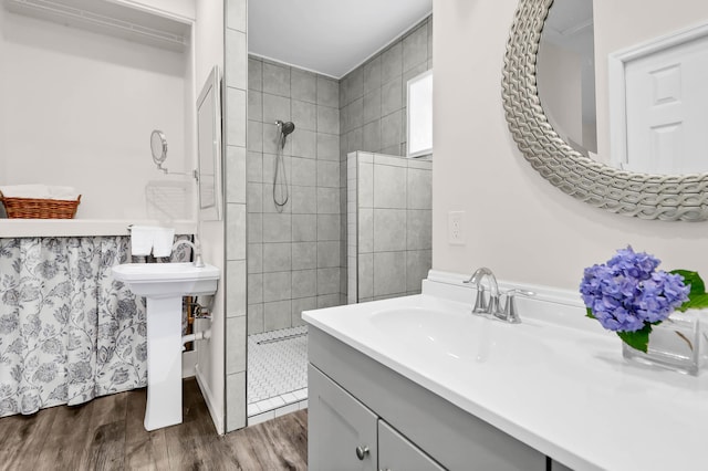 5233 Maybank Hwy, Wadmalaw Island, SC 29487 - full bathroom featuring a sink, a walk in shower, and wood finished floors
