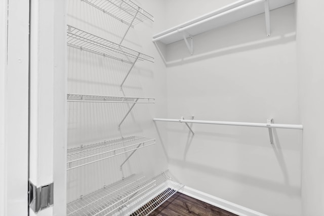 5233 Maybank Hwy, Wadmalaw Island, SC 29487 - spacious closet with dark wood-style flooring