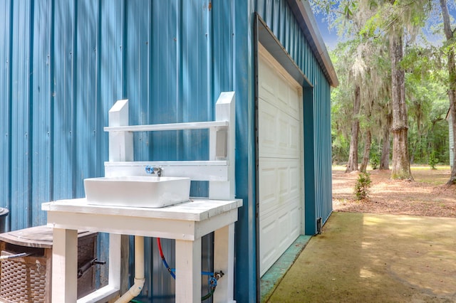5233 Maybank Hwy, Wadmalaw Island, SC 29487 - view of side of property with board and batten siding
