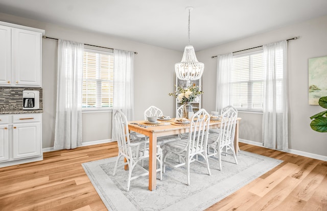 153 Glory Rd, Beaufort, SC 29906 - dining space with a chandelier and light wood-style flooring