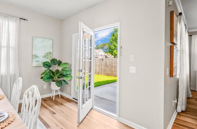153 Glory Rd, Beaufort, SC 29906 - entryway with light wood-style floors and french doors