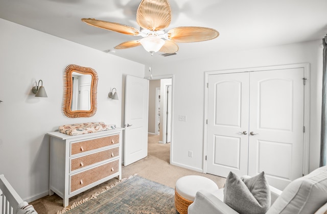 153 Glory Rd, Beaufort, SC 29906 - bedroom featuring light colored carpet, a closet, and a ceiling fan