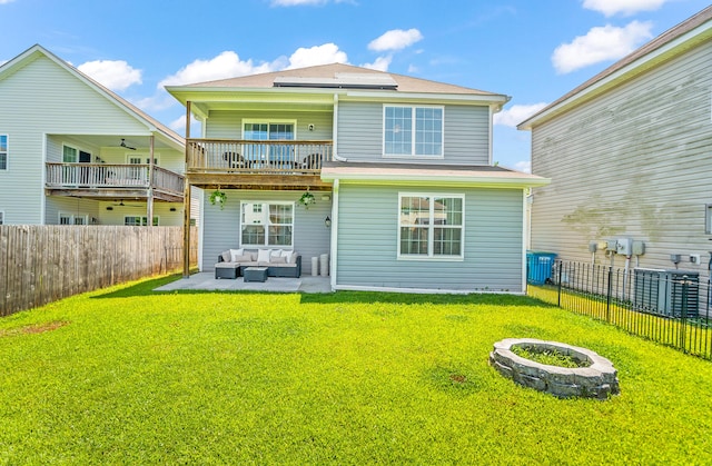 153 Glory Rd, Beaufort, SC 29906 - back of property featuring an outdoor living space, a fenced backyard, a ceiling fan, and roof mounted solar panels