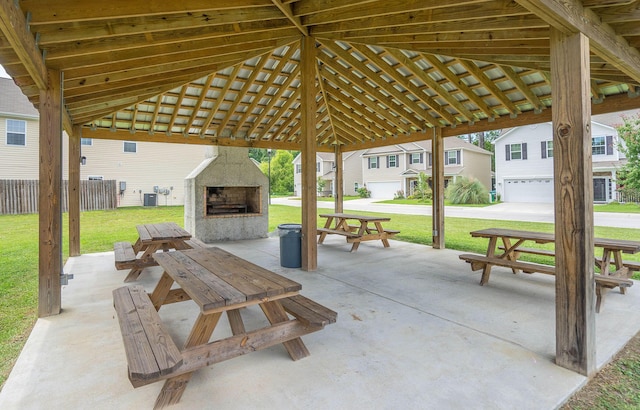 153 Glory Rd, Beaufort, SC 29906 - view of patio / terrace featuring a multi sided fireplace, a gazebo, and a residential view
