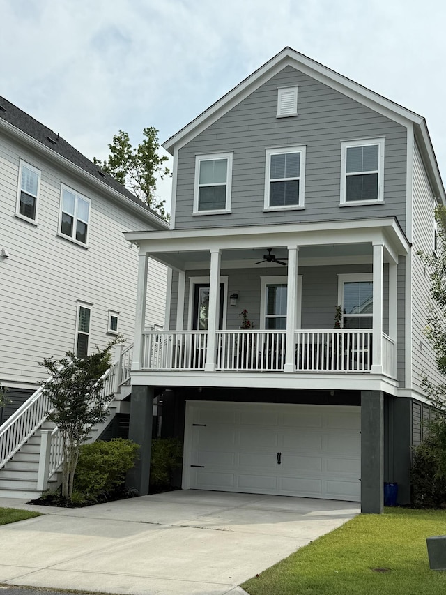 3016 Evening Tide Dr, Hanahan, SC 29410 - view of front of house with stairs, an attached garage, concrete driveway, and covered porch