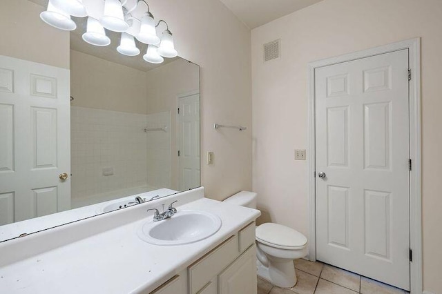 bathroom featuring tile patterned floors, visible vents, toilet, a notable chandelier, and vanity