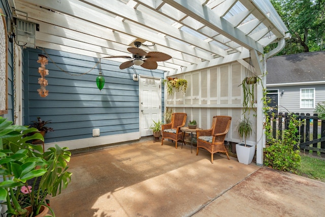 view of patio / terrace featuring a pergola and a ceiling fan