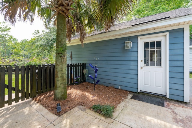 property entrance with a patio