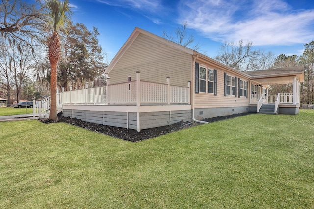 view of home's exterior featuring a yard, crawl space, and a wooden deck