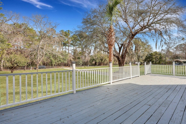 wooden deck with a yard