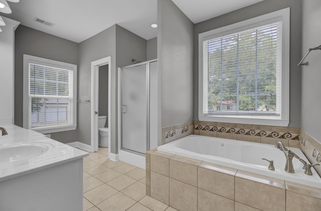 full bathroom featuring tile patterned flooring, vanity, toilet, and plus walk in shower