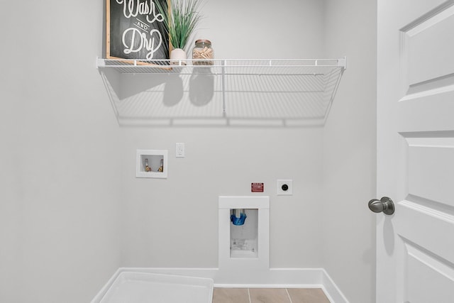 laundry room with hookup for an electric dryer, hookup for a washing machine, and light tile patterned floors