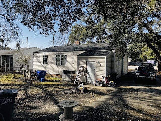 1255 Remount Rd, North Charleston, SC 29406 - back of house with crawl space and a chimney