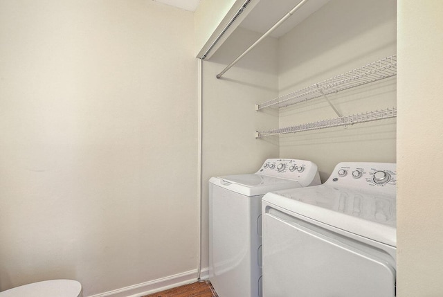 638 Harbor Creek Pl Unit 19, Charleston, SC 29412 - washroom featuring washing machine and clothes dryer and baseboards