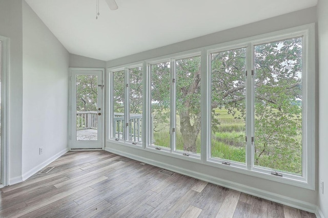 638 Harbor Creek Pl Unit 19, Charleston, SC 29412 - unfurnished sunroom with healthy amount of natural light, vaulted ceiling, and wood finished floors