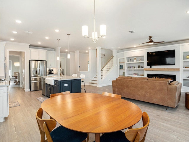 2064 Parish House Cir, Johns Island, SC 29455 - dining space featuring recessed lighting, stairway, light wood-style floors, a ceiling fan, and visible vents