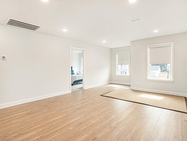 2064 Parish House Cir, Johns Island, SC 29455 - empty room featuring baseboards, visible vents, light wood-style floors, and recessed lighting