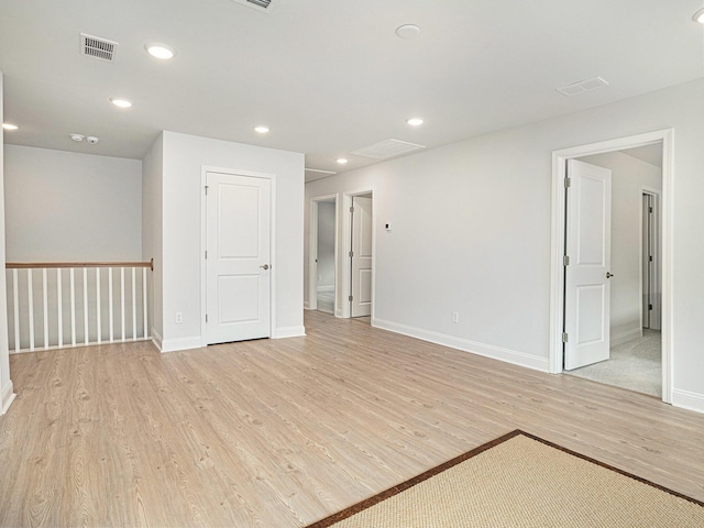 2064 Parish House Cir, Johns Island, SC 29455 - empty room featuring visible vents, baseboards, recessed lighting, and light wood-style floors