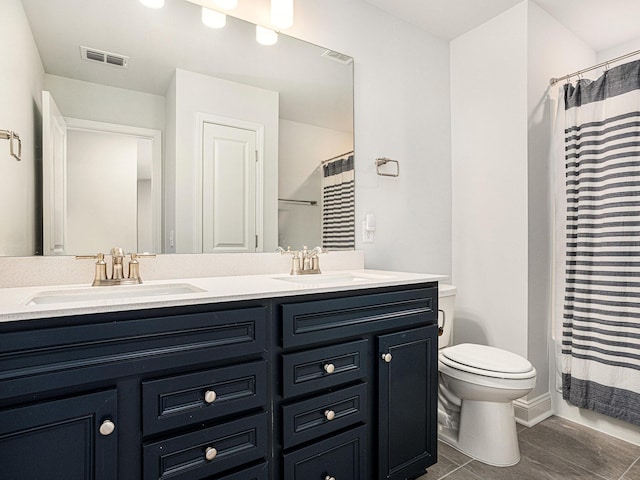 2064 Parish House Cir, Johns Island, SC 29455 - full bathroom with double vanity, visible vents, toilet, and a sink