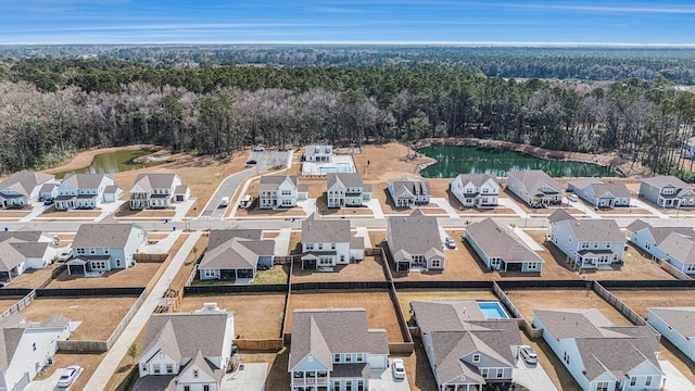 2064 Parish House Cir, Johns Island, SC 29455 - aerial view featuring a wooded view, a residential view, and a water view