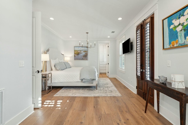 bedroom featuring crown molding, baseboards, recessed lighting, a notable chandelier, and wood-type flooring