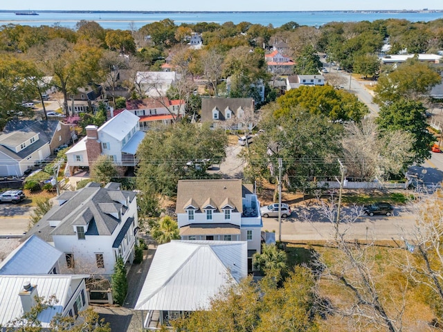 aerial view with a residential view and a water view