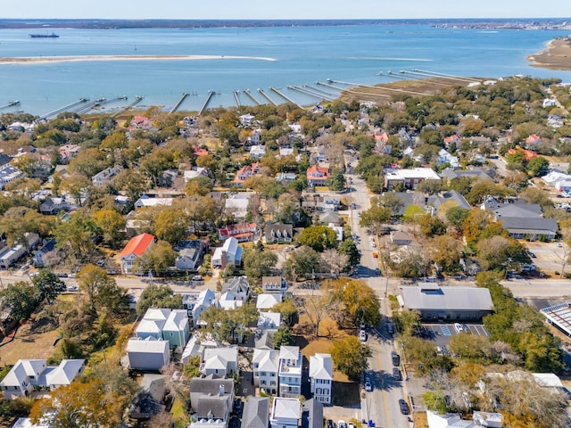 bird's eye view featuring a water view and a residential view