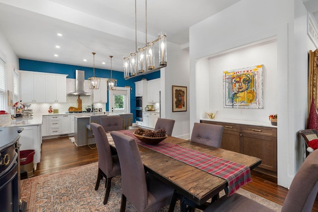 dining room featuring dark wood-type flooring