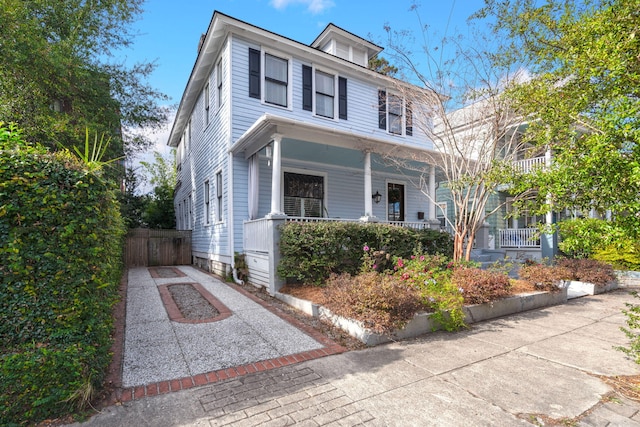 view of front property featuring covered porch