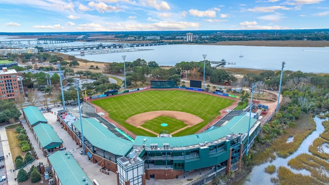 birds eye view of property with a water view