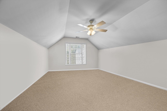 bonus room featuring ceiling fan, carpet, and vaulted ceiling