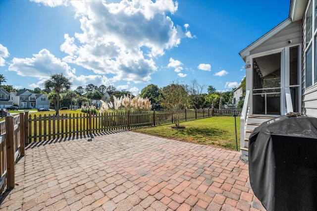 view of patio with a grill