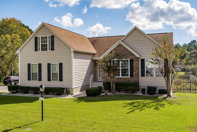 view of front of property featuring a front yard