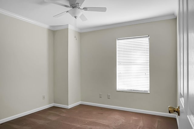 unfurnished room with dark carpet, ceiling fan, and crown molding